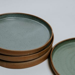 Blue plates with a brown lip
