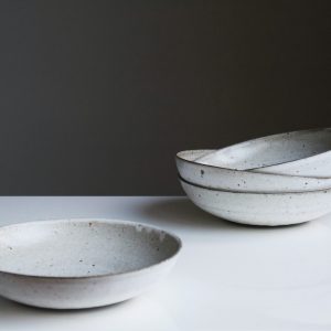 A pile of white plates